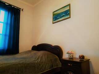 Гостевой дом Гостевой Дом Сухум Семейный номер-2